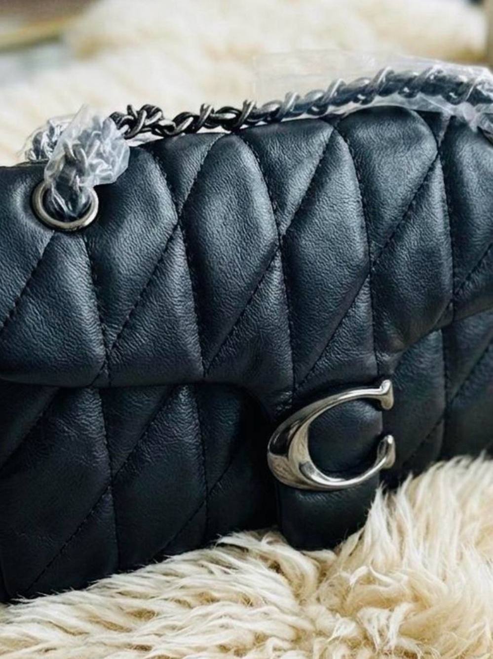 Black Quilted Leather Shoulder Bag with Silver Hardware